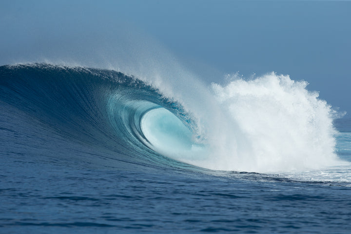Big wave curling into a pipe