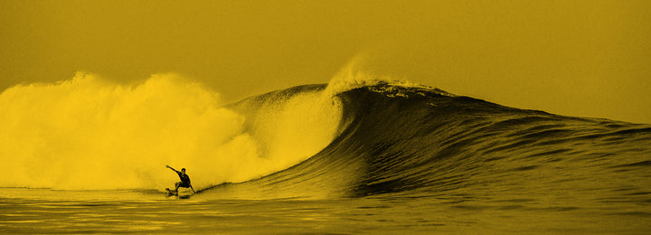 Yellow tone picture of big wave curling