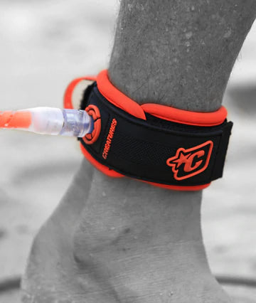 close up of surf leash attached to ankle